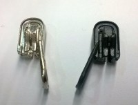 Carro para cremallera reversible